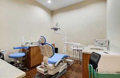 dental chair inside the exam room at Dental Images of Gwinnett in Lawrenceville, GA